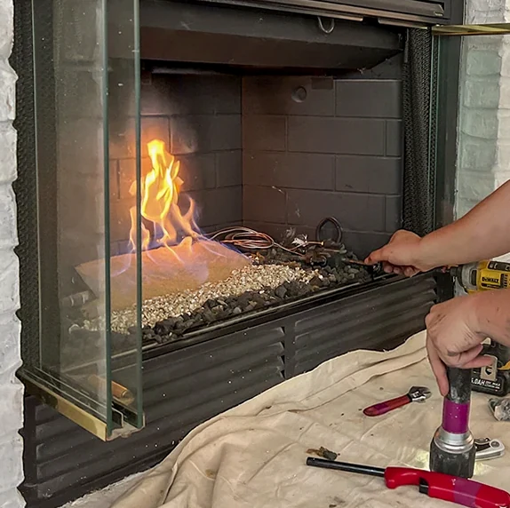 Gas Fireplace Repair professional at work in Montgomery, AL